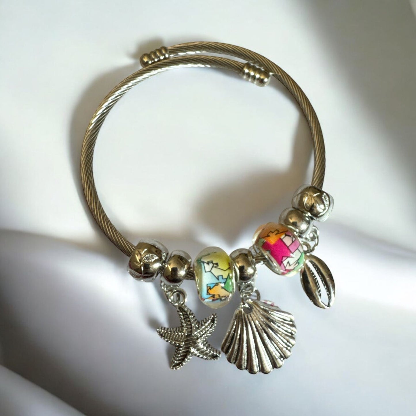 Silver Look Copper Bangle with Shells & Bell Charms