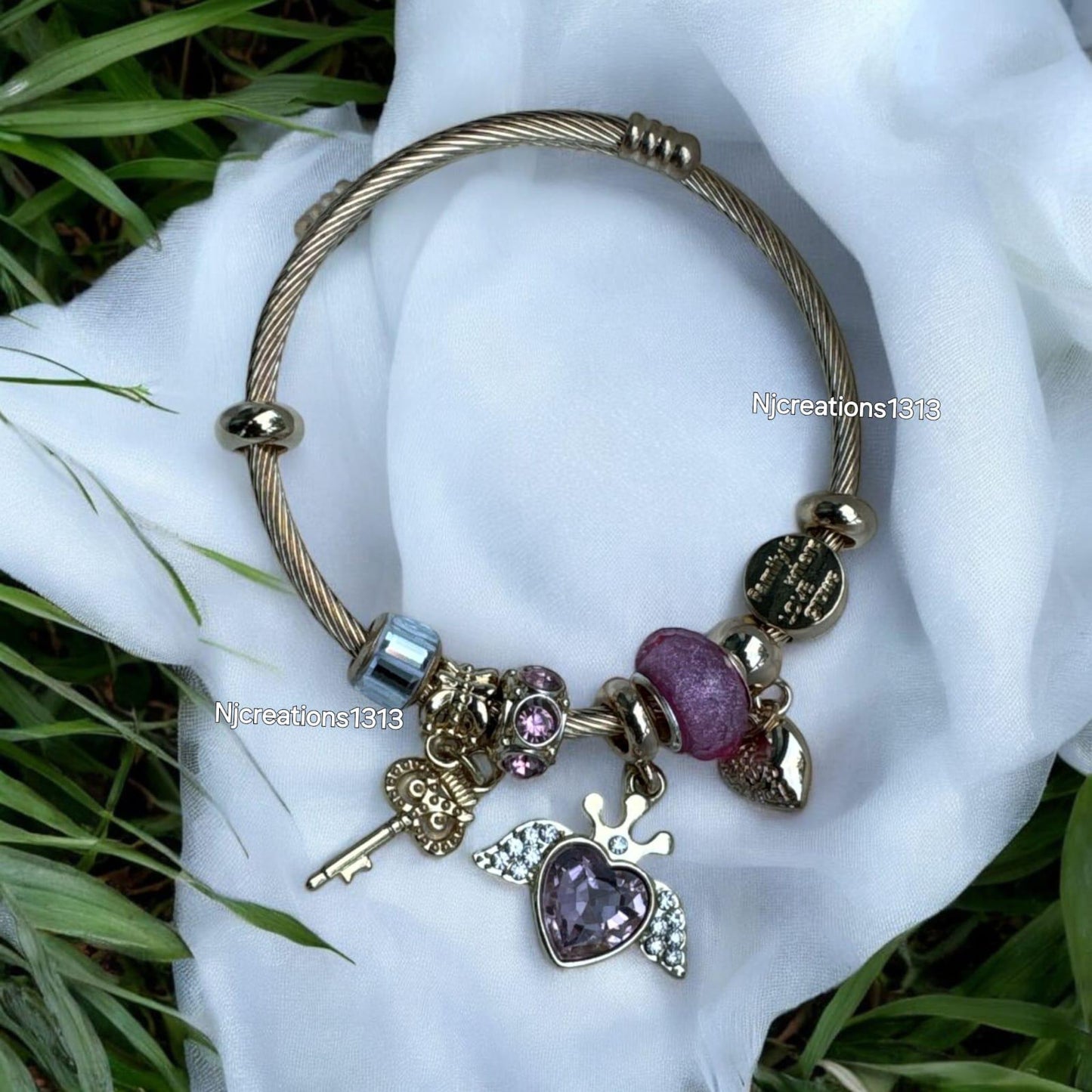 Golg Plated Copper Bangle With Multiple Charms