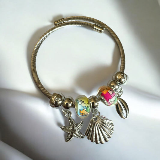 Silver Look Copper Bangle with Shells & Bell Charms