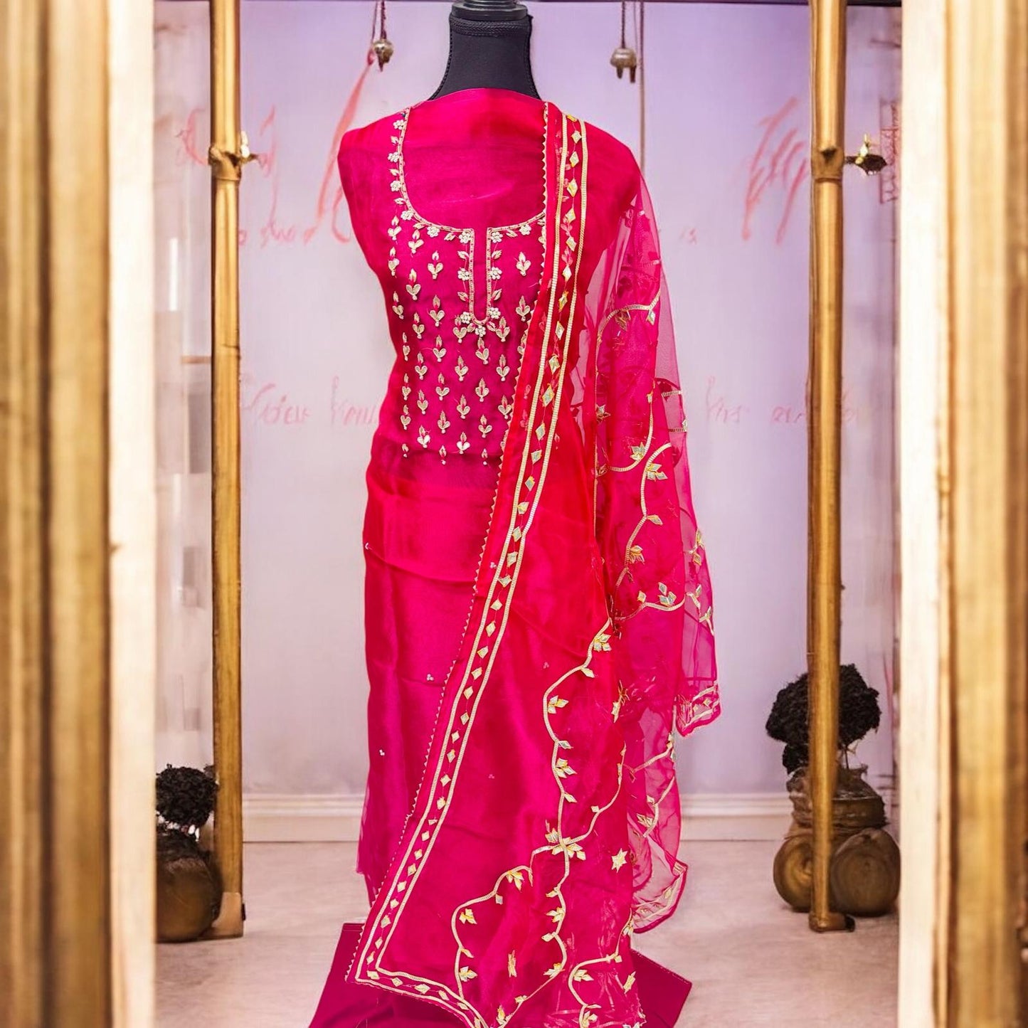 Rani pink organza Suit with fully finished gotta-Patti dupatta