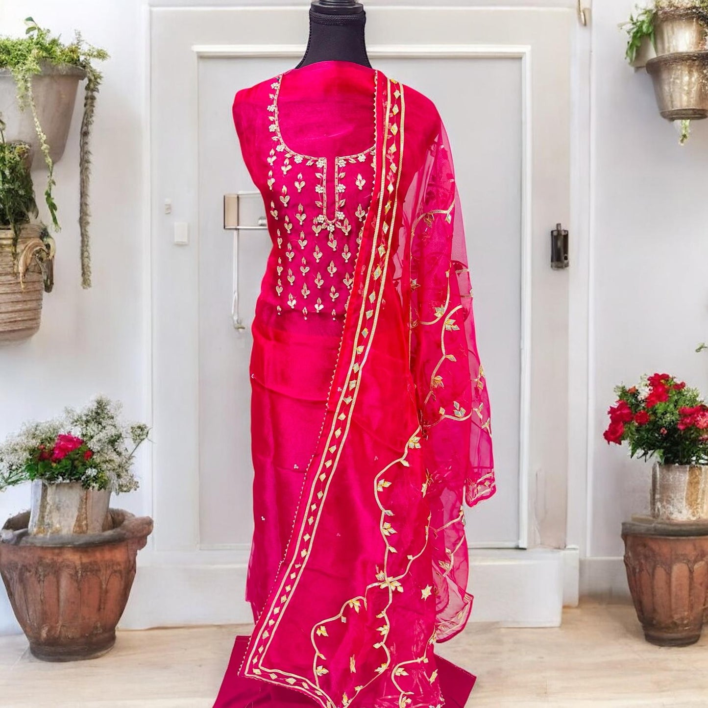 Rani pink organza Suit with fully finished gotta-Patti dupatta
